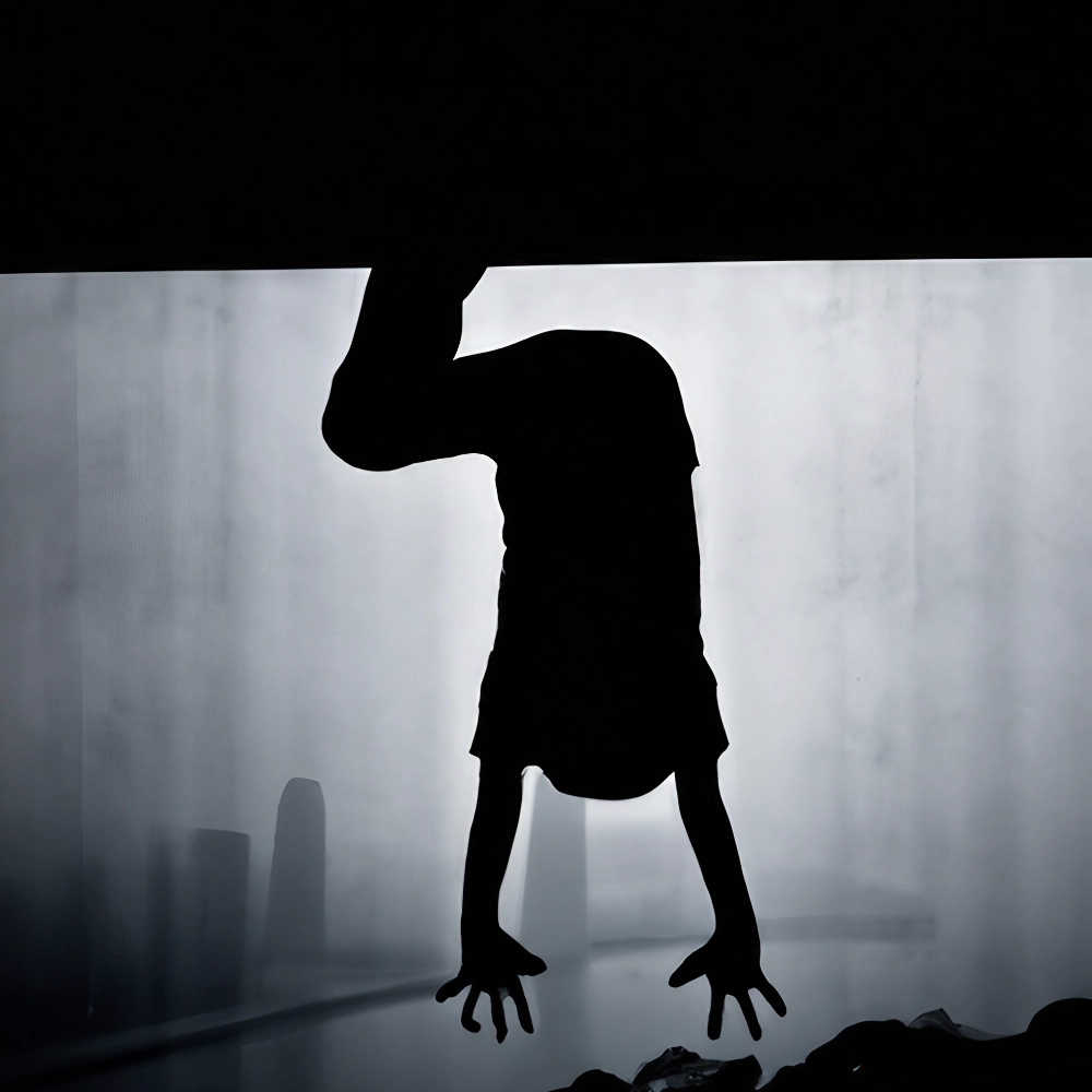 Upside down silhouette representing property stress and uncertainty during conveyancing